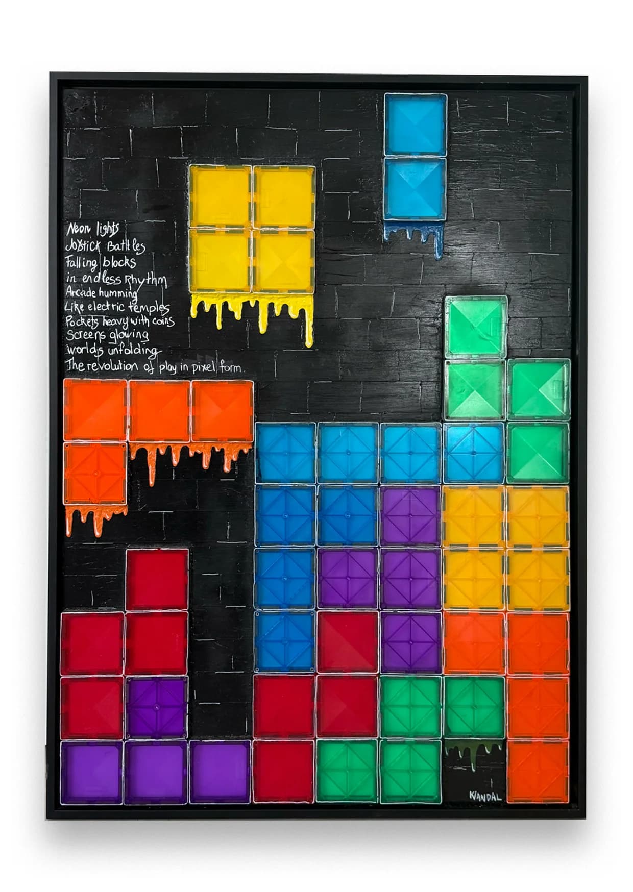 Front view of Tetris Magna (2025): colorful magnetic construction tiles and acrylic shapes arranged on illuminated panel.